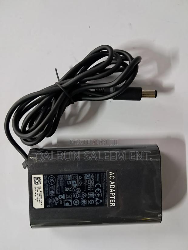 Original and Brand-New Dell Oval Big Pin 65W Laptop Charger · Photo 1