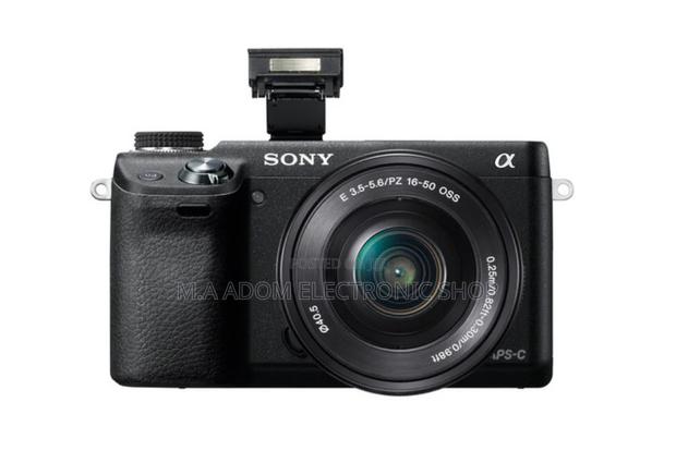 Sony Alpha NEX-6 Mirrorless Digital Camera-Flash Up View · Photo 1