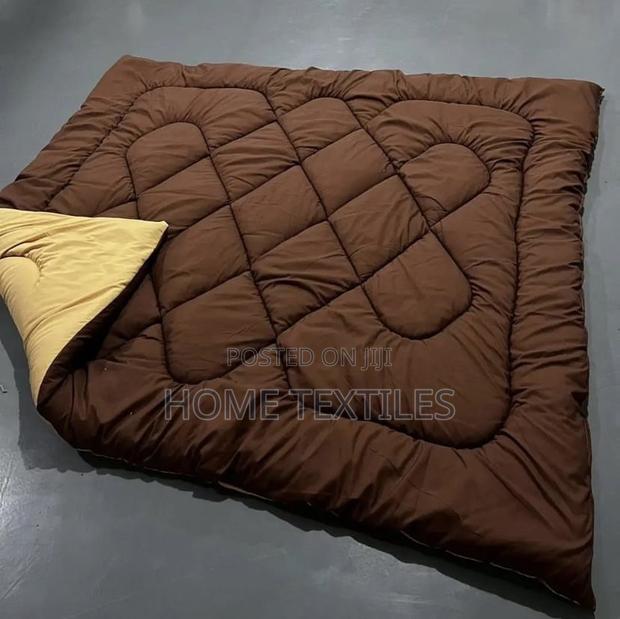 Reversible Duvets Sets and Bedsheets With Pillow Cases · Photo 1