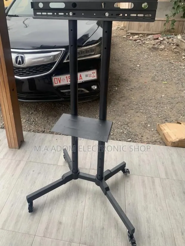 Buy Original Mobile Tv Stand With Wheels for 32”-70” Tv. · Photo 1