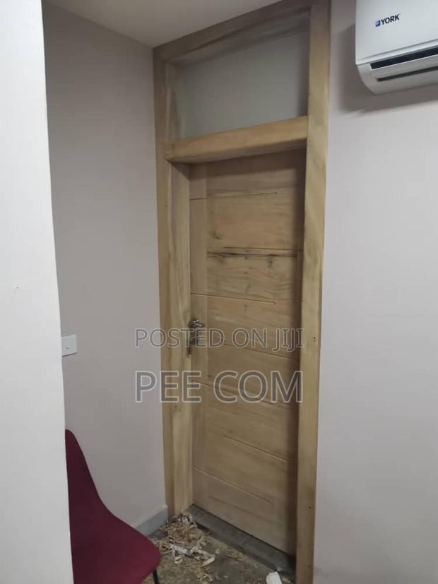 Wooden Doors and Fanlight · Photo 1