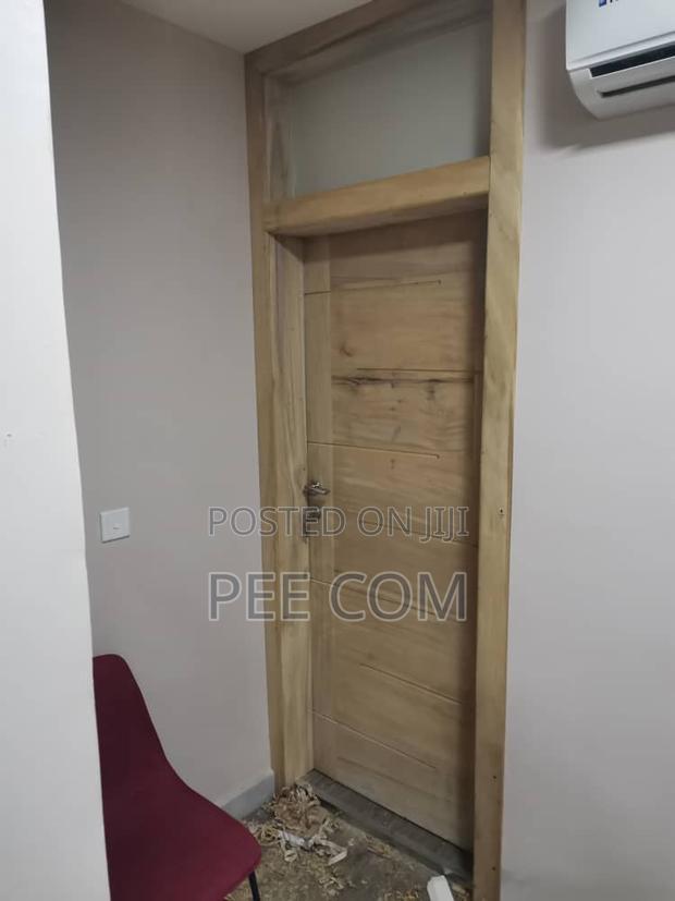 Wooden Doors and Fanlight · Photo 3