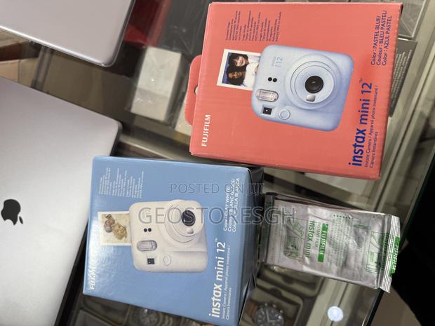 Fujifilm Instax Mini 12 Instant Camera With a Free Pack of Film · Photo 1
