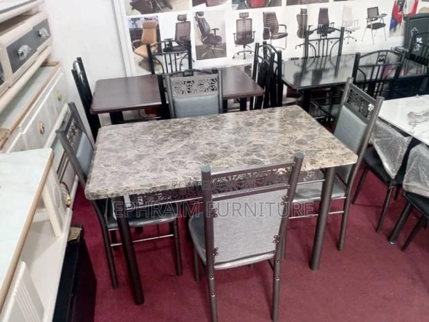 Four Dinning Table