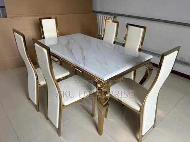 Luxury Dining Table With 6 Chairs Marble Gold · Photo 1