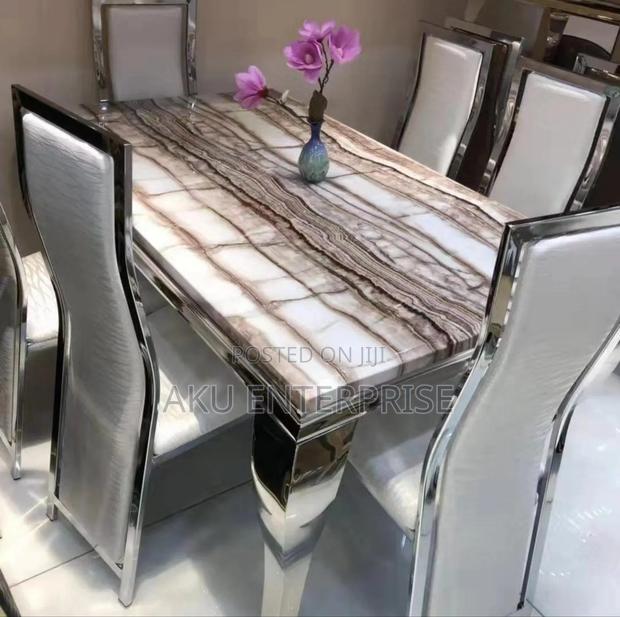 Luxury Dining Table With 6 Chairs Marble Gold · Photo 1