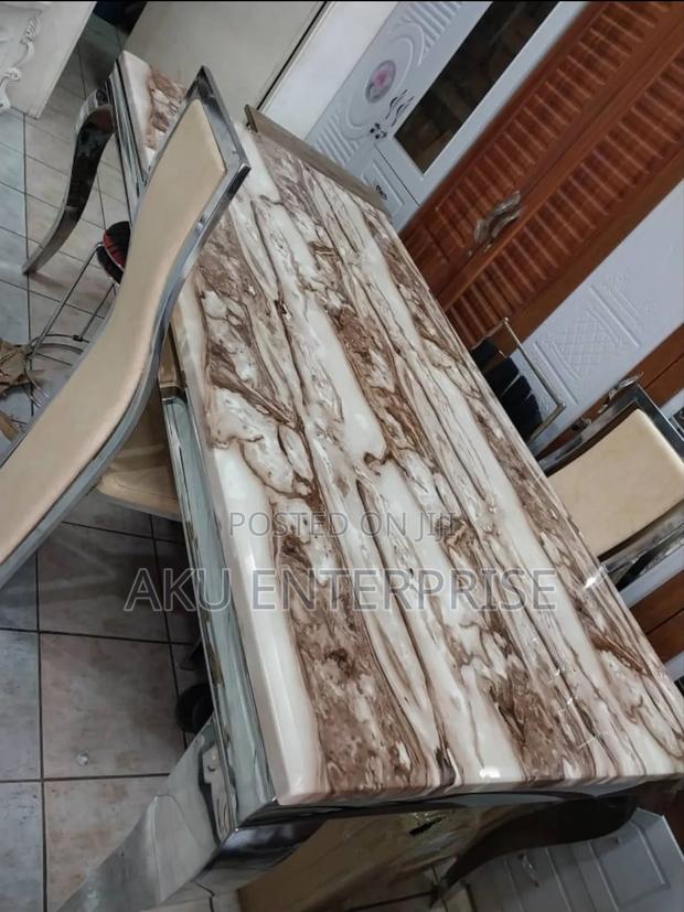 Luxury Dining Table With 6 Chairs Marble Gold · Photo 2