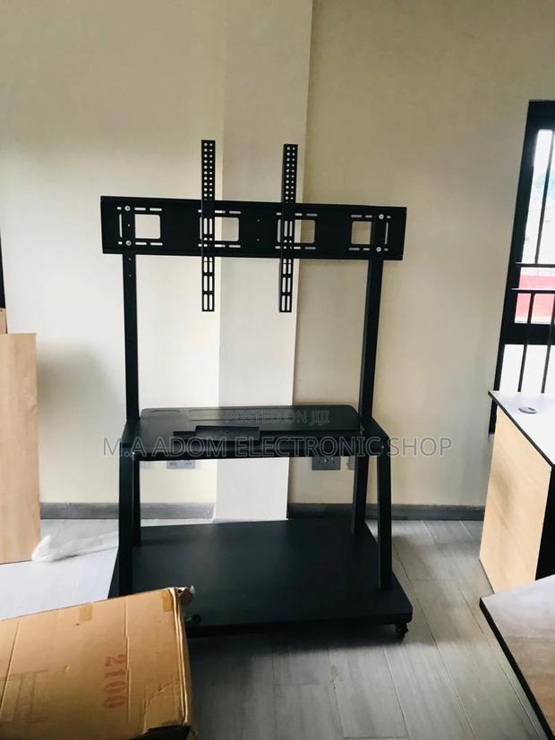 Versatile Mobile TV Stand for Your Home Theater · Photo 1