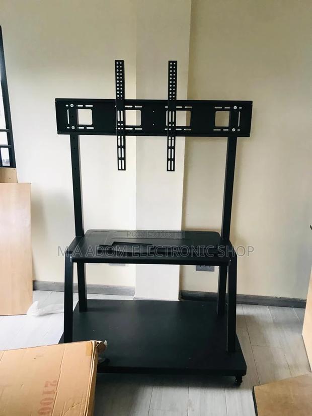 Mobile TV Stand - Your Versatile Entertainment Solution · Photo 1