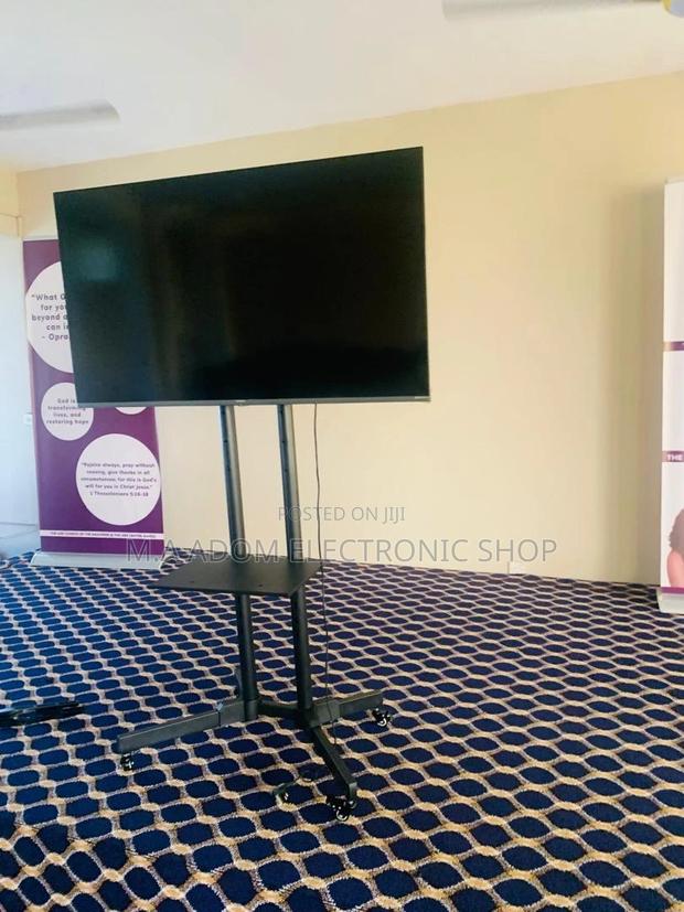 Mobile TV Stand - Your Versatile Entertainment Solution · Photo 1