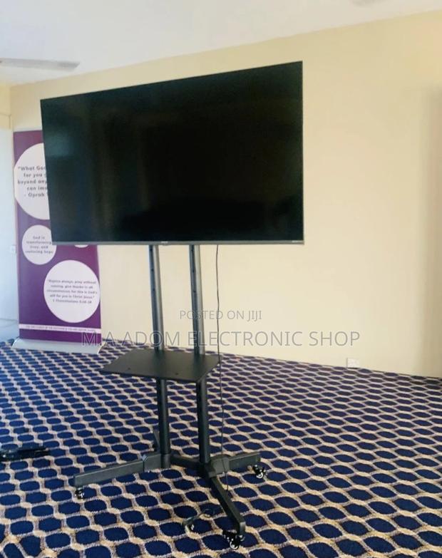 Order Mobile Tv Stand With Wheels for 32-70” · Photo 1