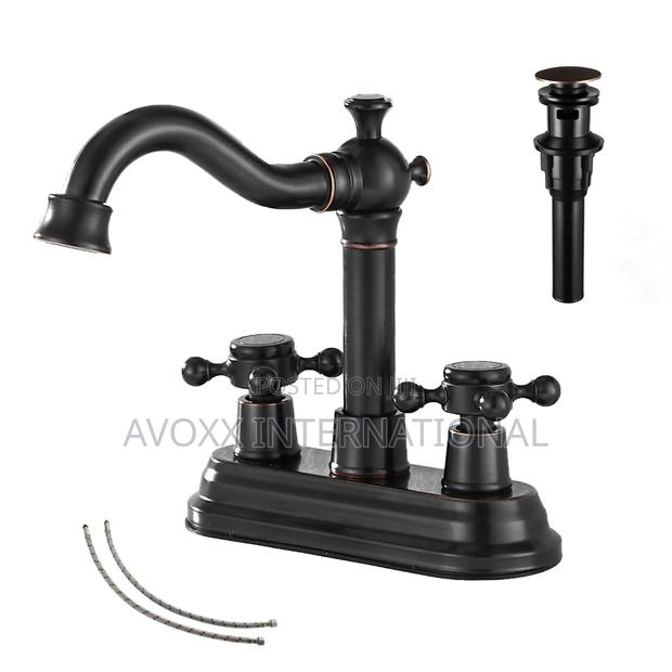 Ggstudy Bathroom Faucet Oil Rubbed Bronze 2 Handles 4" · Photo 1