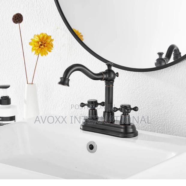 Ggstudy Bathroom Faucet Oil Rubbed Bronze 2 Handles 4" · Photo 5
