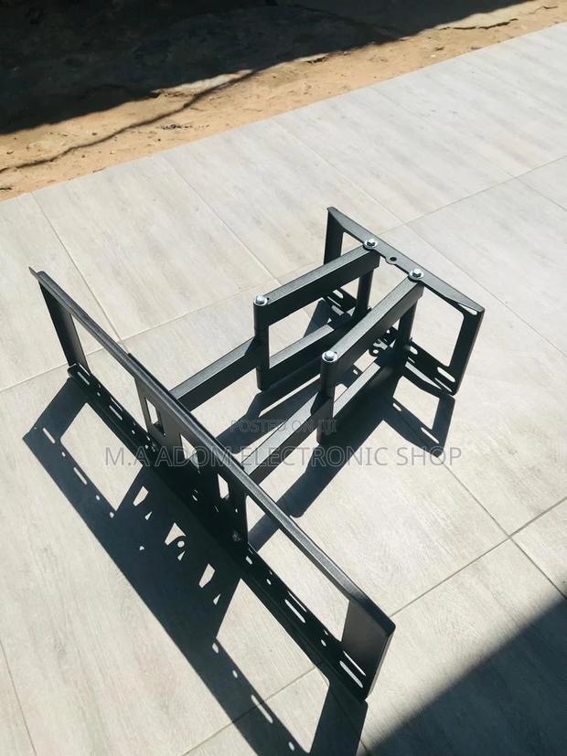 Upgrade Your TV Viewing Experience- Adjustable TV Wall Mount · Photo 1