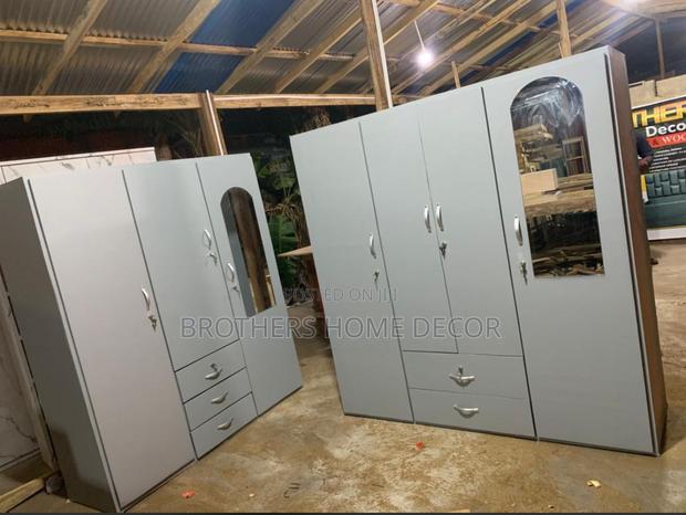 Laminated Three Doors Wardrobe. Foreign Wood.