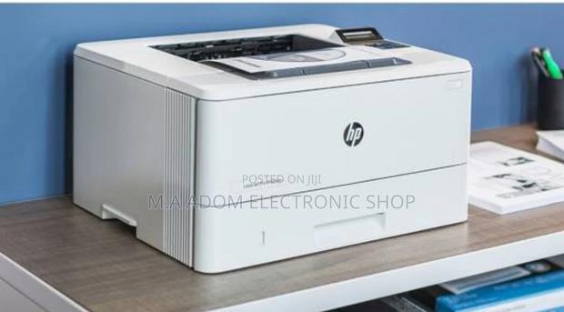 HP Laserjet Pro 4003dn: Fast and Reliable · Photo 1