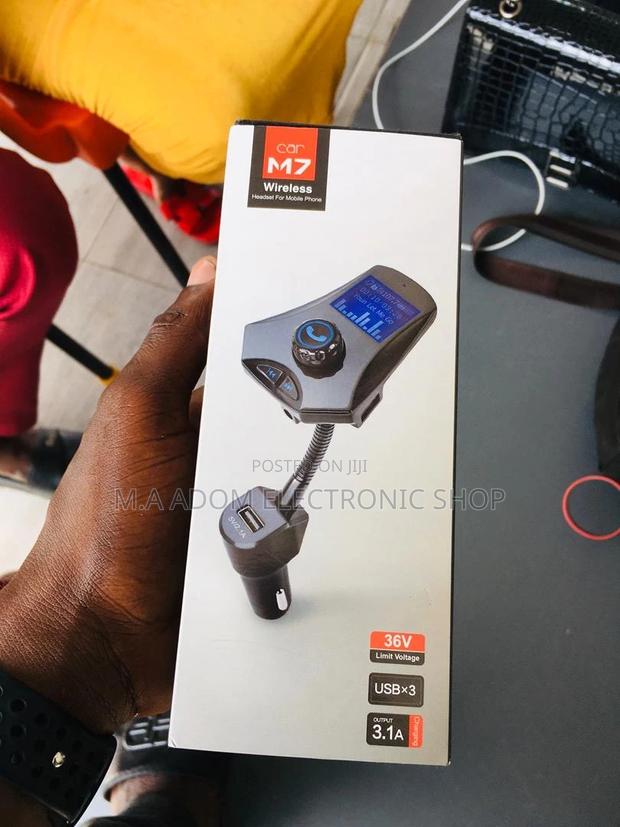 M7 Bluetooth Car Kit: Drive Safely, Stay Connected · Photo 1