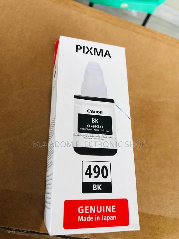 Canon GI-590 Ink Bottles: Budget-Friendly Printing Solution · Photo 1