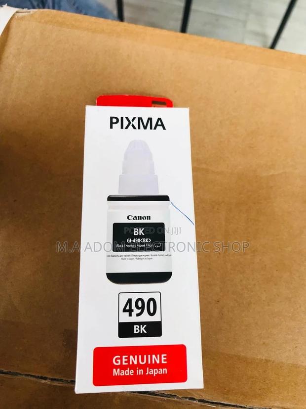 Canon GI-590 Ink Bottles: High-Quality, Low-Cost Printing · Photo 1