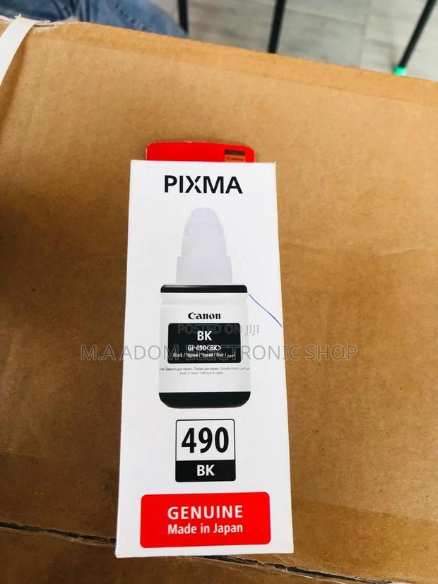 Canon GI-590 Ink Bottles: Print More, Worry Less · Photo 1