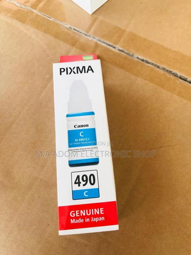 Canon GI-590 Ink Bottles: Bring Your Colors to Life · Photo 1