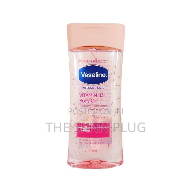 Vaseline Intensive Care Vitamin B3 Body Oil Pink. · Photo 1