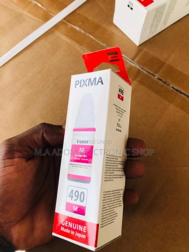 Canon GI-590 Red Ink: Your Creative Printing Essential · Photo 1