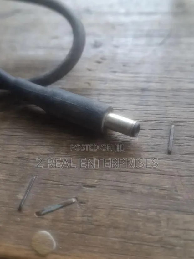 Dell 130W AC Power Adapter (Part Number: 06TTY6 / 6TTY6) · Photo 1