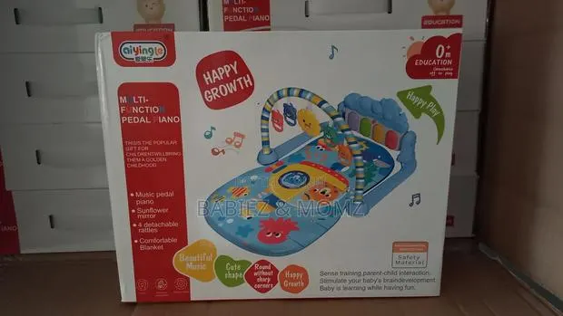 4-in-1 Multifunctional Baby Gym Music Mat · Photo 1