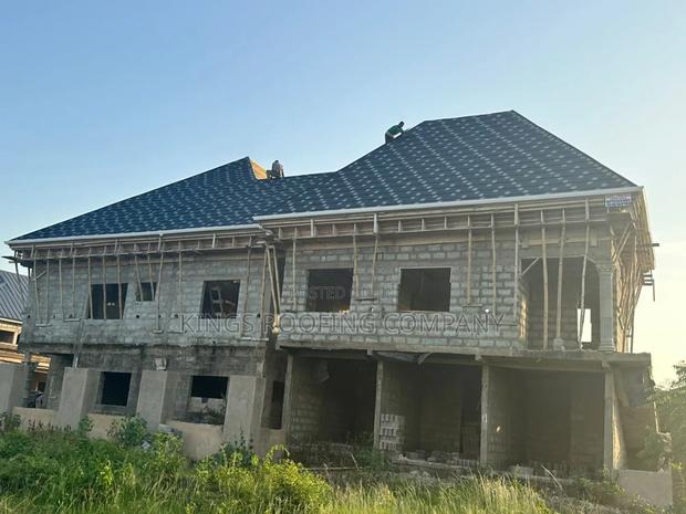 Alu-Zinc (Black and White Patch Shingles) · Photo 1