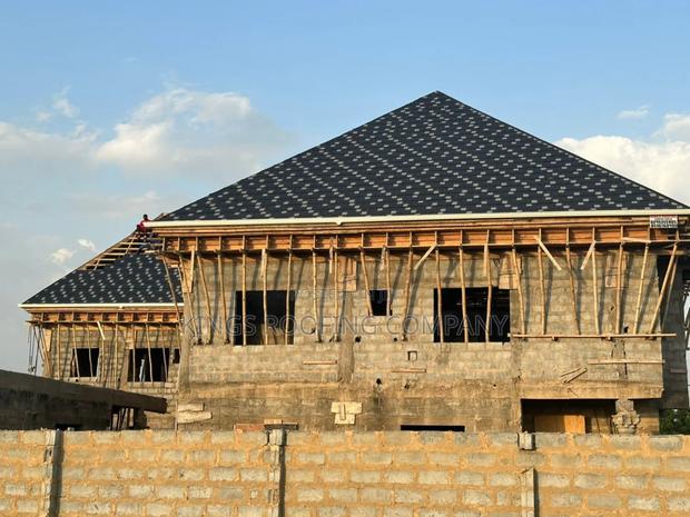 Concrete Parapet, Wood-Work Structure and Euro-Tiles · Photo 1