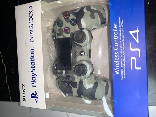 PS4 Wireless Dual Controller.Brand New · Photo 1