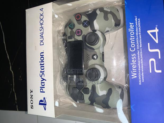 PS4 Wireless Dual Controller.Brand New · Photo 2