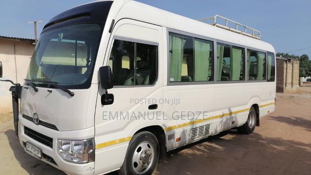 Coaster Bus Rental (New Type) for Tour and Town Riding · Photo 1
