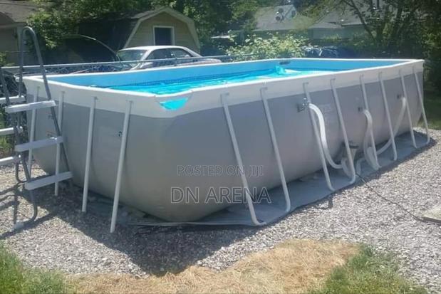 Potable 24ft by 12ft by 5ft Swimming Pool With Pump · Photo 1
