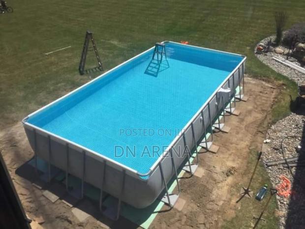 Potable 24ft by 12ft by 5ft Swimming Pool With Pump · Photo 2