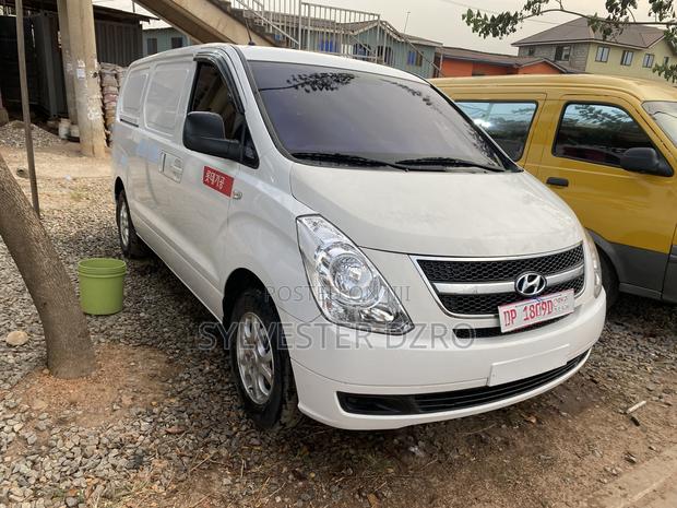 Hyundai Starex 2014 White · Photo 1