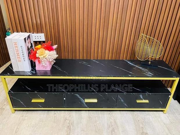 Black and Gold Tv Stand With Drawer · Photo 1