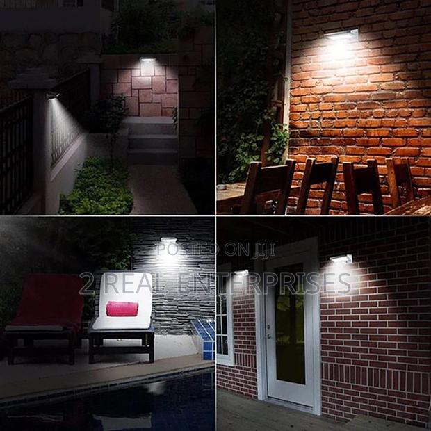 Luceco IP54 Era Solar Brick PIR Wall Light · Photo 1