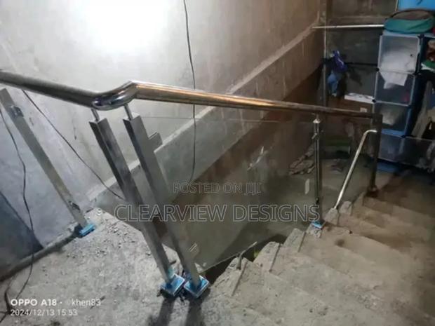 Modern Stainless Steel Glass Railing · Photo 1