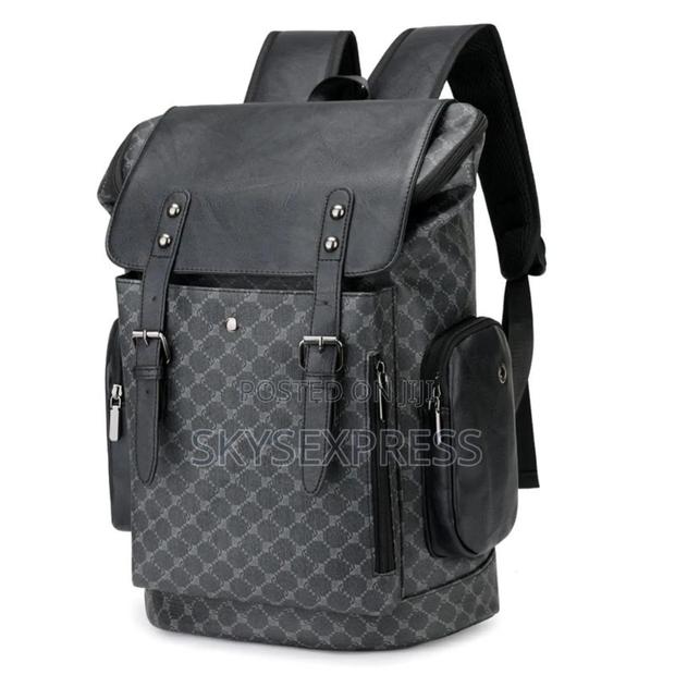 Leather Backpack for Laptops and Personal Use · Photo 2