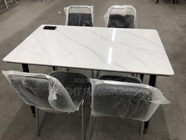 Dining Table With Four (4)Chairs · Photo 1