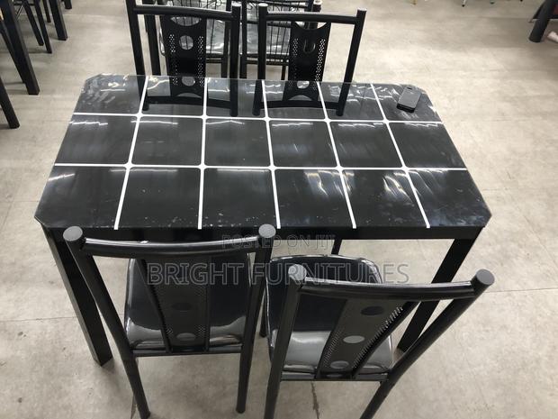 Dining Table With Four Chairs · Photo 2