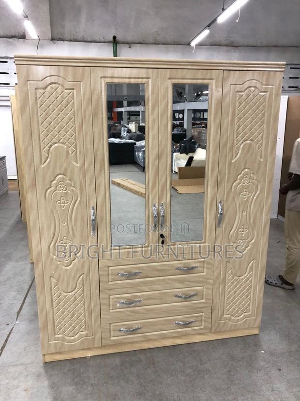 Four Door Wardrobe With Mirror and Drowners · Photo 1