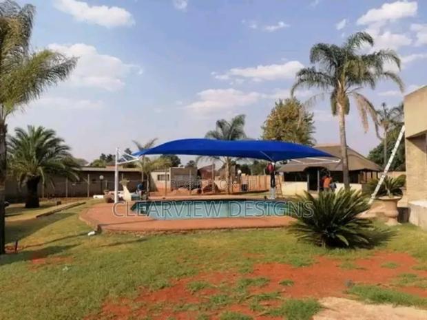 Poolside Shade Structure / Canopy · Photo 1