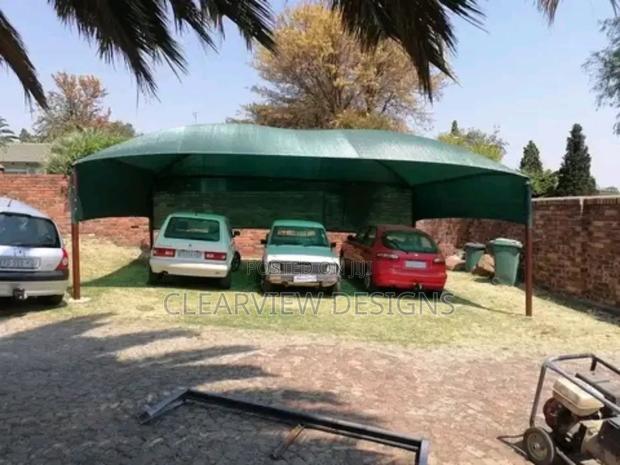 Three-Car Carport Shade Structure · Photo 1