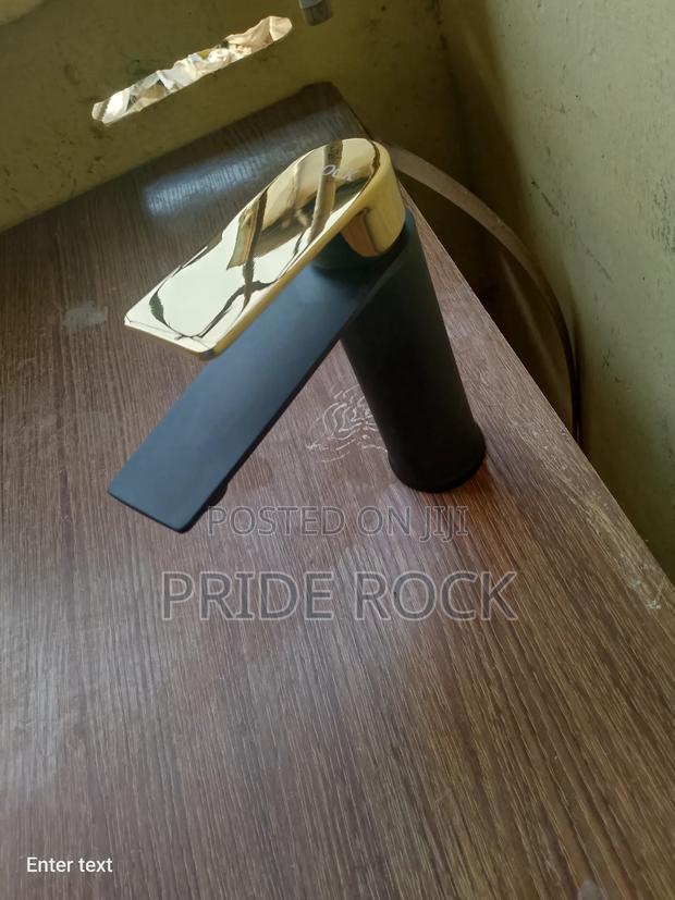 Black and Gold Mixture Tap,Hot and Cold Basin Tap,Faucet · Photo 1