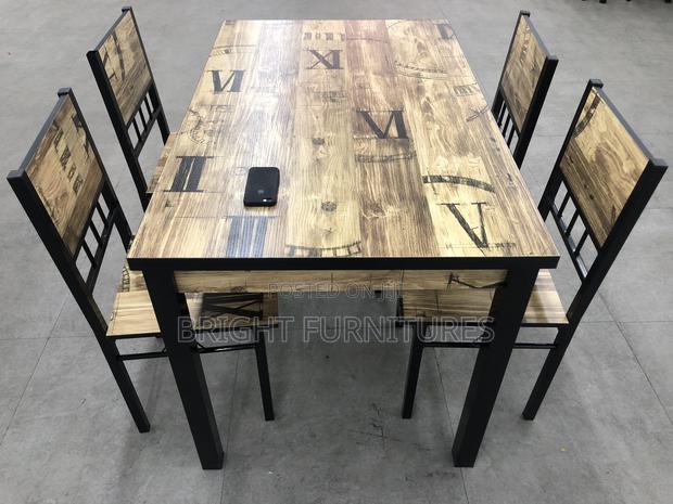 Importanted Wooden Dining Table With Four Chairs · Photo 1