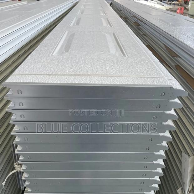 Automated Garage Door Panels · Photo 2
