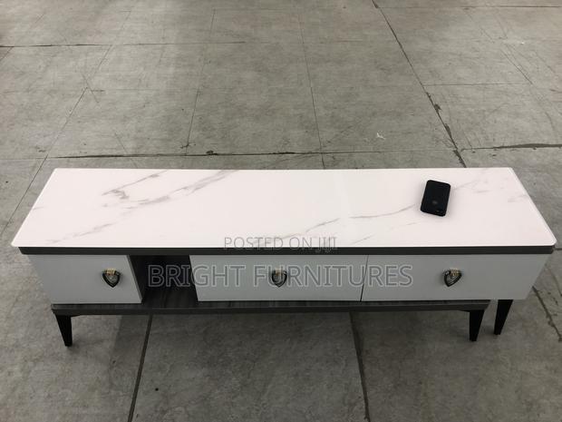 Foreign TV Stand With Drowners · Photo 2
